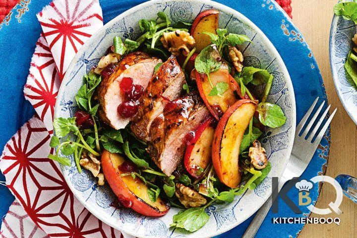 Pork with apple and watercress salad